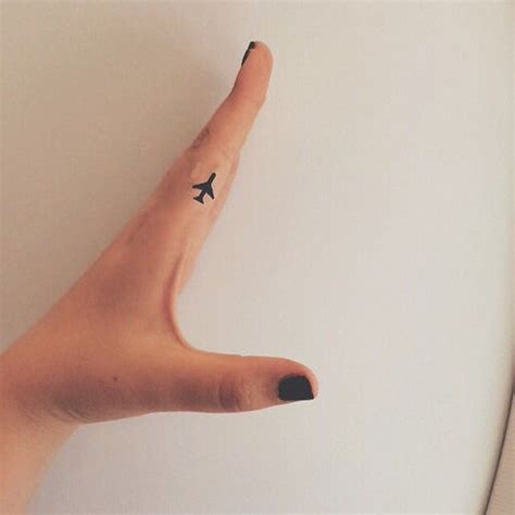 tiny airplane tattoo|More.